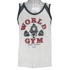 1990s vintage World Gym, Santa Monica USA sleeveless workout shirt. Grey in color with black trim, has a big printed graphic of the gorilla logo on front and back, fits Medium in size, and is in excellent condition.