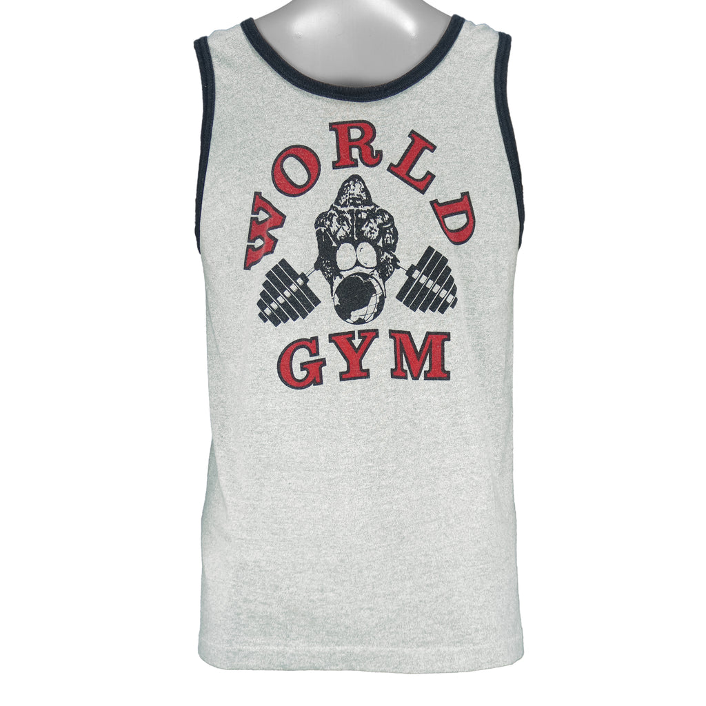 1990s vintage World Gym, Santa Monica USA sleeveless workout shirt. Grey in color with black trim, has a big printed graphic of the gorilla logo on front and back, fits Medium in size, and is in excellent condition.