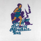 1987 vintage Great Olympic Mountain Run T-Shirt by My Shirt is Made in the USA. White in color with printed graphic on front, tagged size Large, and is in excellent condition.