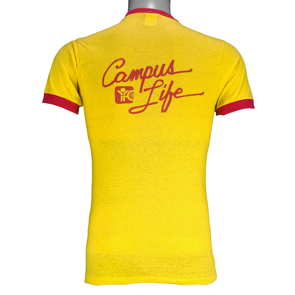 1980s vintage Pepsi Challenge: 10,000 Meter Series ringer T-Shirt. Yellow in color with red trim, Campus Life spell-out on back, tagged size Medium and is in excellent condition.