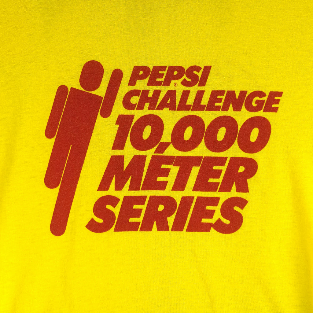 1980s vintage Pepsi Challenge: 10,000 Meter Series ringer T-Shirt. Yellow in color with red trim, Campus Life spell-out on back, tagged size Medium and is in excellent condition.