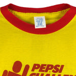 1980s vintage Pepsi Challenge: 10,000 Meter Series ringer T-Shirt. Yellow in color with red trim, Campus Life spell-out on back, tagged size Medium and is in excellent condition.