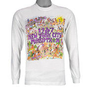 1987 vintage I Trained for the New York City Marathon Long Sleeve Shirt. White in color with original artwork by Kay Denmark on front, fits Small in size and is in excellent condition.