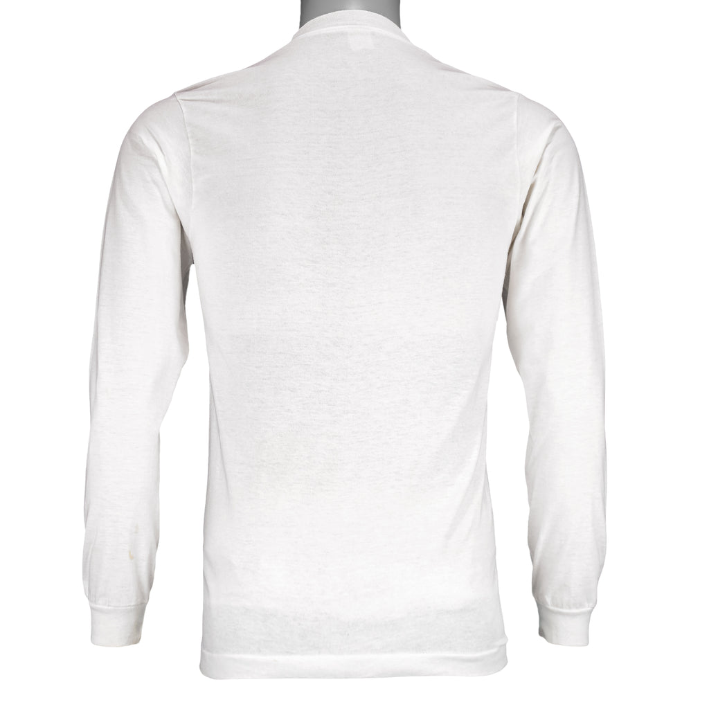 1987 vintage I Trained for the New York City Marathon Long Sleeve Shirt. White in color with original artwork by Kay Denmark on front, fits Small in size and is in excellent condition.