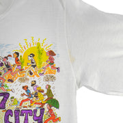 1987 vintage I Trained for the New York City Marathon Long Sleeve Shirt. White in color with original artwork by Kay Denmark on front, fits Small in size and is in excellent condition.