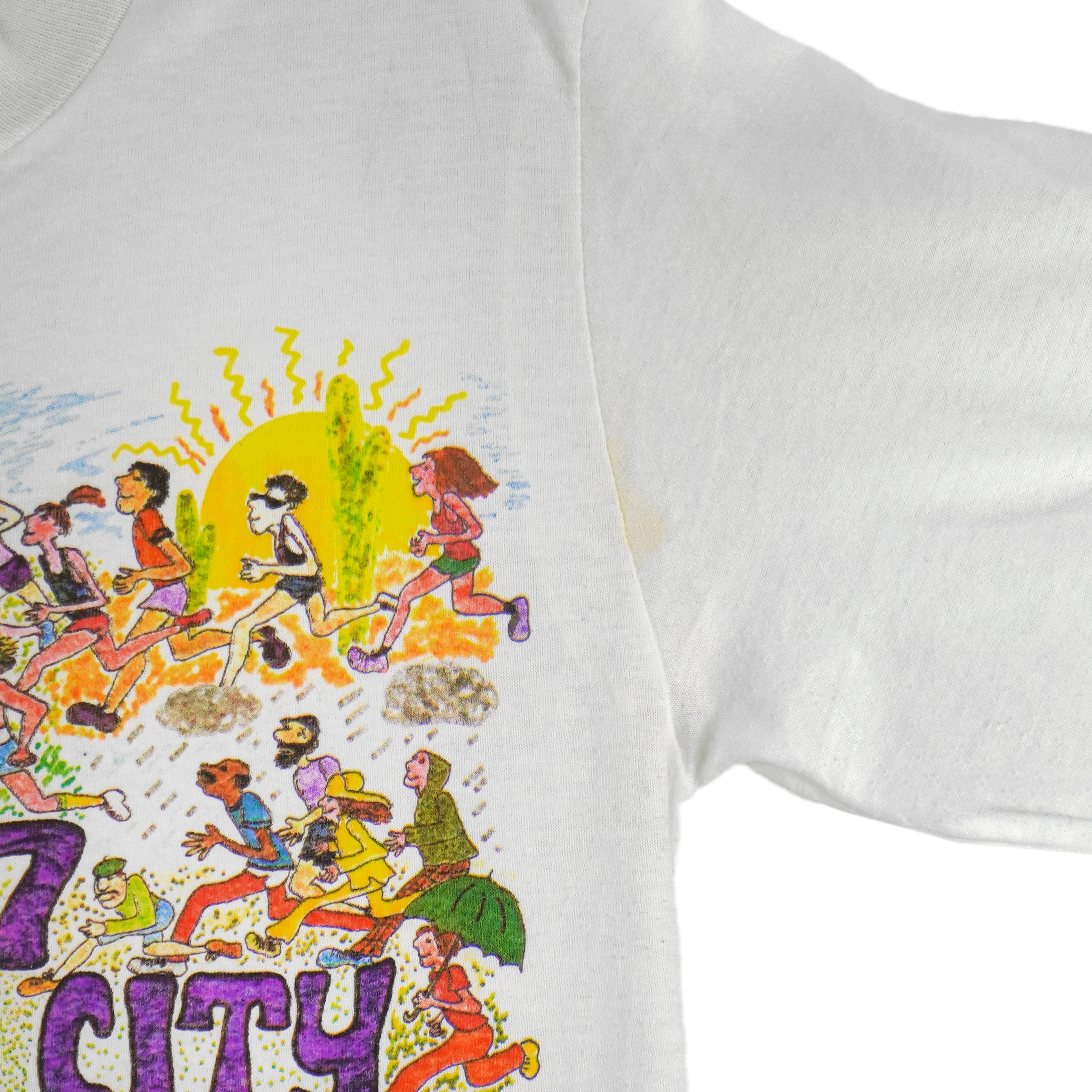 1987 vintage I Trained for the New York City Marathon Long Sleeve Shirt. White in color with original artwork by Kay Denmark on front, fits Small in size and is in excellent condition.