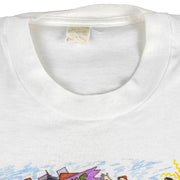 1987 vintage I Trained for the New York City Marathon Long Sleeve Shirt. White in color with original artwork by Kay Denmark on front, fits Small in size and is in excellent condition.