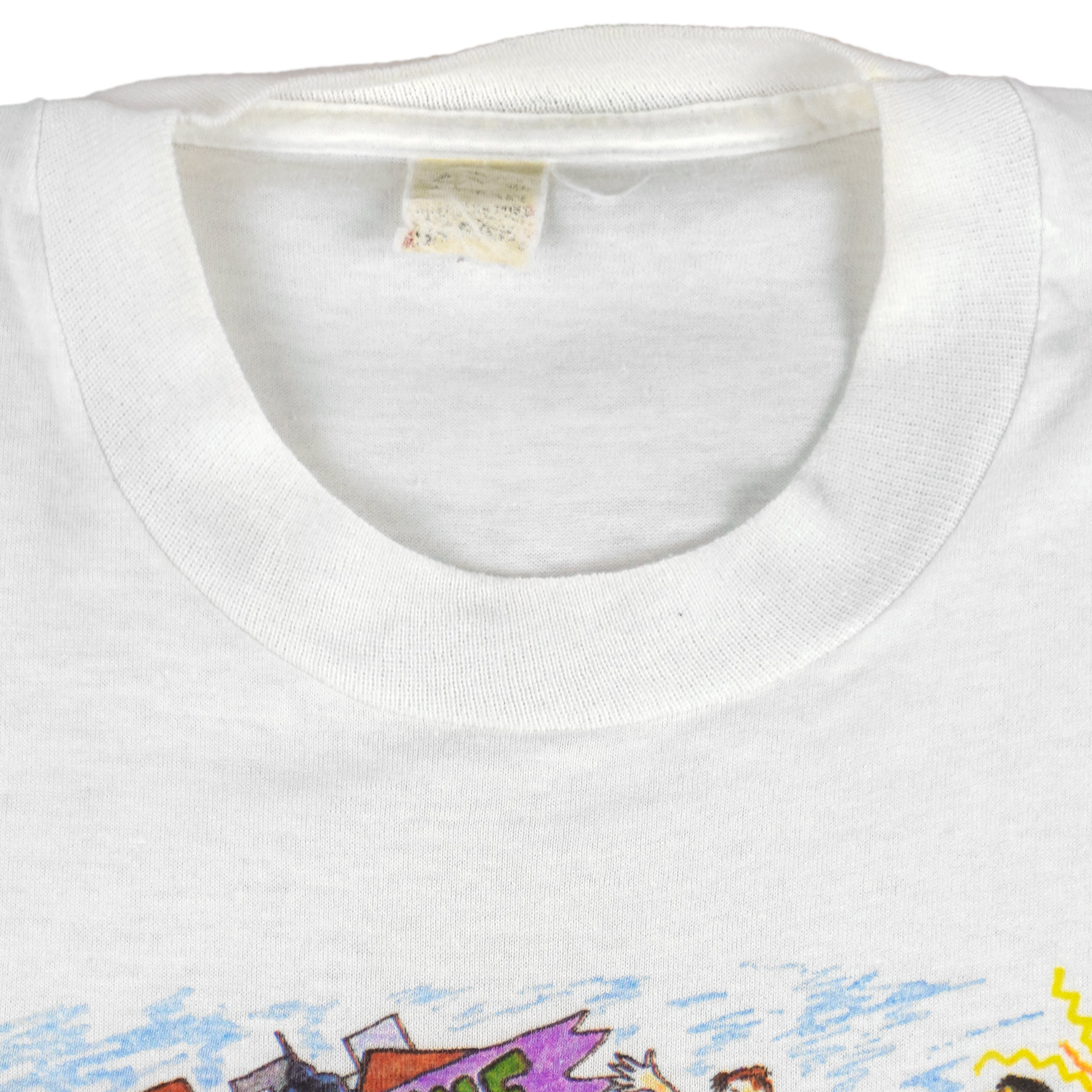 1987 vintage I Trained for the New York City Marathon Long Sleeve Shirt. White in color with original artwork by Kay Denmark on front, fits Small in size and is in excellent condition.