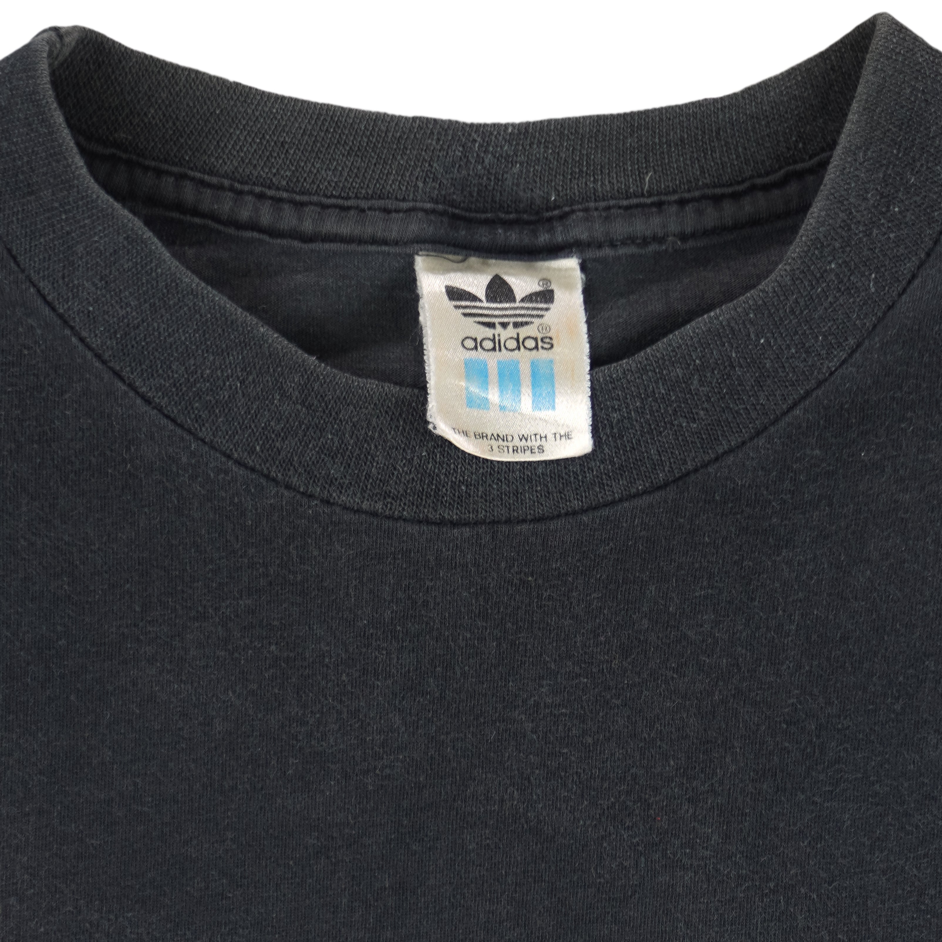 1990s vintage Adidas cheeky-motivational T-Shirt. Black in color with multiple text elements and small logo on front and large NOT spell-out on back, fits size Large and is in excellent condition.