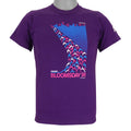 1991 vintage Bloomsday, Spokane Washington, Finisher T-Shirt by Jerzees. Purple in color with abstract people and skyline graphic printed on front and Nike insignia on left sleeve, tagged size Small and is in excellent condition.