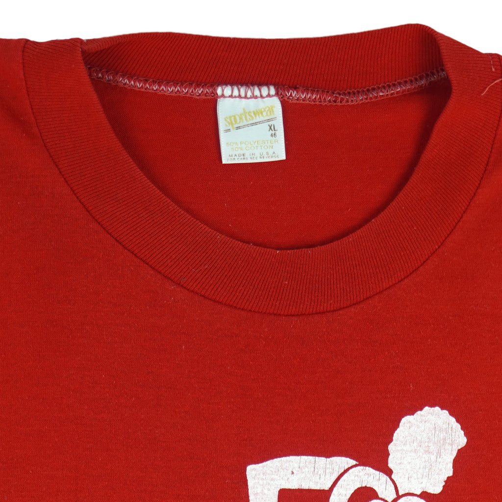 1990s vintage Maxwell Air Force Base, Alabama, SOS Fun Run T-Shirt by Sportswear. Red in color with printed graphic on front and back, tagged size X-Large, and is in excellent condition.