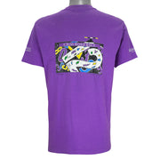 1988 vintage Flint Michigan 8 KM Crim Road Race T-Shirt by Hanes. Purple in color with printed&nbsp; graphics on front and back, tagged size Large and is in excellent condition.