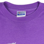 1988 vintage Flint Michigan 8 KM Crim Road Race T-Shirt by Hanes. Purple in color with printed&nbsp; graphics on front and back, tagged size Large and is in excellent condition.