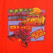 1990s vintage Bug at the Beach Puerto Rico tank top by America Project. Red in color with printed Volkswagen Beetles on front, tagged size X-Large, and is in excellent condition.