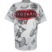 NCAA (TSI) - Nebraska Huskers All Over Print T-Shirt 1990s X-Large Vintage Retro Football