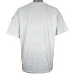 NCAA (TSI) - Nebraska Huskers All Over Print T-Shirt 1990s X-Large Vintage Retro Football