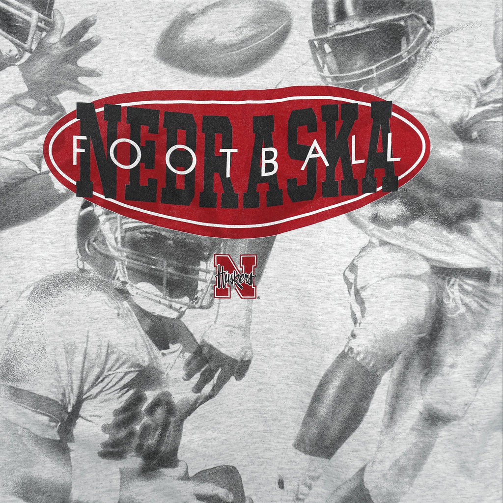 NCAA (TSI) - Nebraska Huskers All Over Print T-Shirt 1990s X-Large Vintage Retro Football