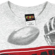 NCAA (TSI) - Nebraska Huskers All Over Print T-Shirt 1990s X-Large Vintage Retro Football