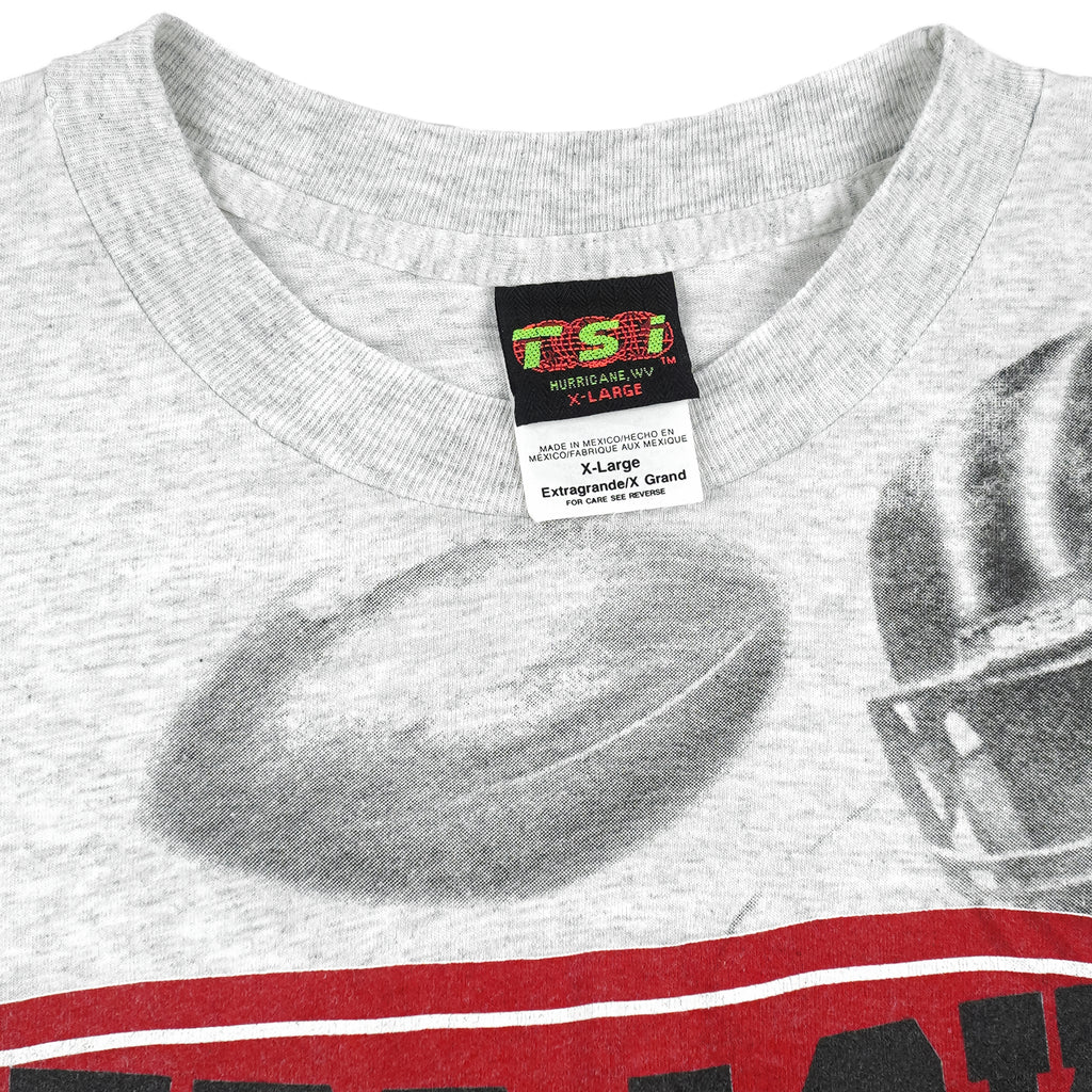 NCAA (TSI) - Nebraska Huskers All Over Print T-Shirt 1990s X-Large Vintage Retro Football
