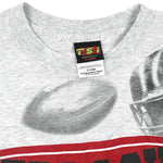 NCAA (TSI) - Nebraska Huskers All Over Print T-Shirt 1990s X-Large Vintage Retro Football