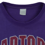 NBA (CGW) - Toronto Raptors Big Spell-Out T-Shirt 1990s X-Large Vintage Retro Basketball