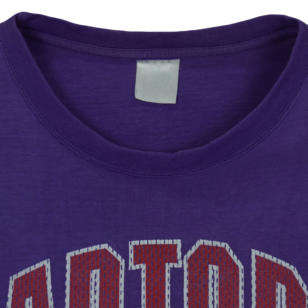 NBA (CGW) - Toronto Raptors Big Spell-Out T-Shirt 1990s X-Large Vintage Retro Basketball