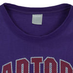 NBA (CGW) - Toronto Raptors Big Spell-Out T-Shirt 1990s X-Large Vintage Retro Basketball