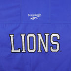 Reebok (Pro Line) - Detroit Lions Long Puffer Jacket 1990s X-Large Vintage Retro Football