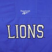 Reebok (Pro Line) - Detroit Lions Long Puffer Jacket 1990s X-Large Vintage Retro Football
