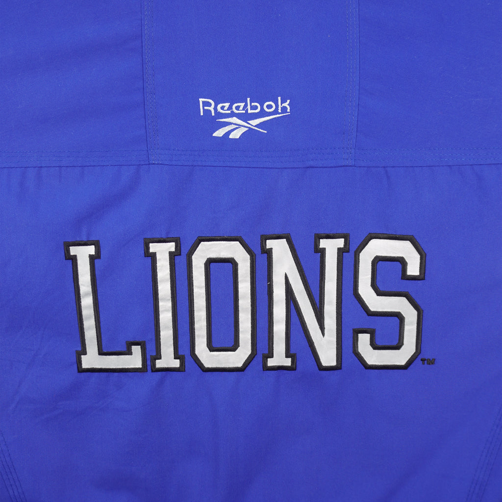 Reebok (Pro Line) - Detroit Lions Long Puffer Jacket 1990s X-Large Vintage Retro Football