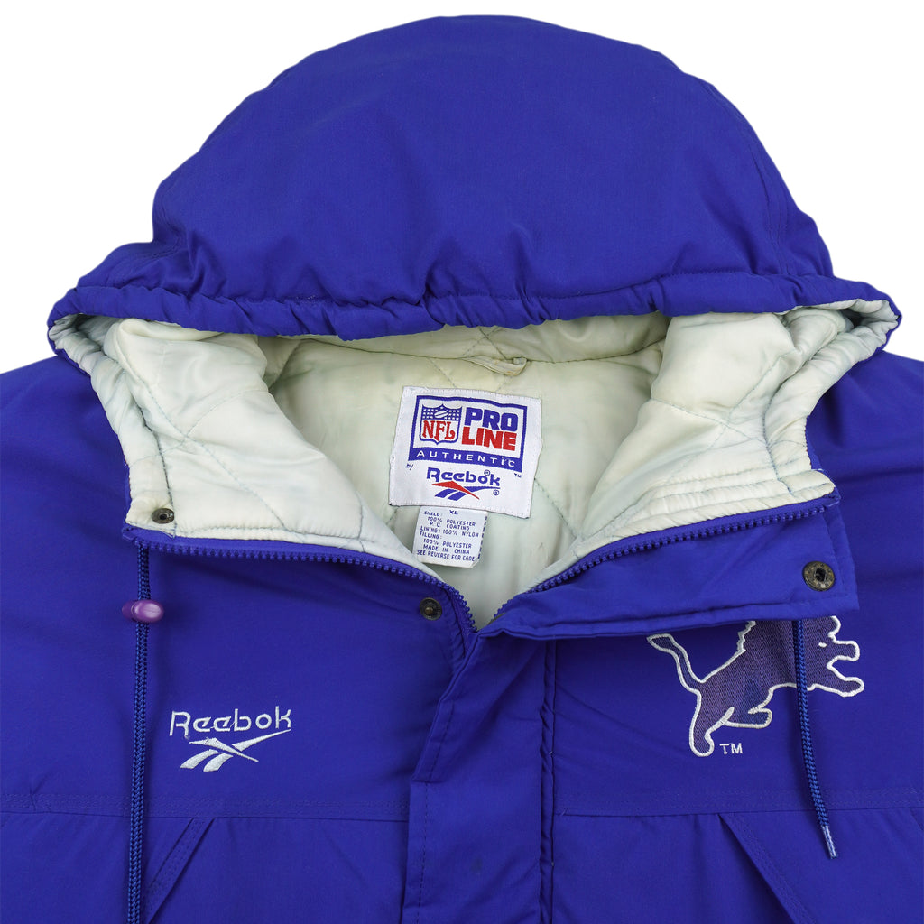 Reebok (Pro Line) - Detroit Lions Long Puffer Jacket 1990s X-Large Vintage Retro Football