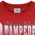 CFL (Waves) - Red Calgary Stampeders Helmet T-Shirt 1990s X-Large Vintage Retro Football