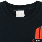 Nike - Black Spell-Out T-Shirt 1990s Large Vintage Retro