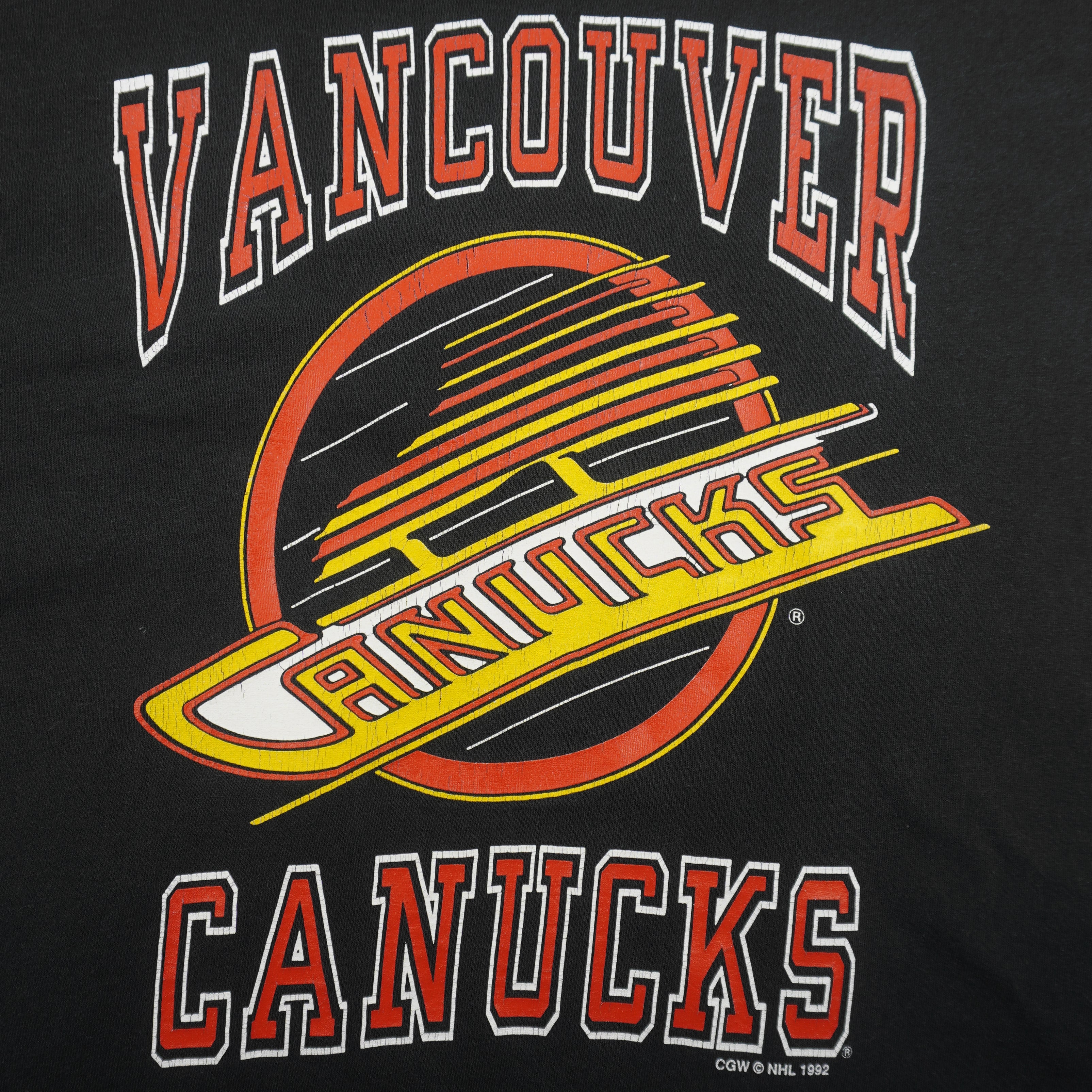 NHL (CGW) - Black Vancouver Canucks Spell-Out T-Shirt 1992 Medium Vintage Retro Hockey