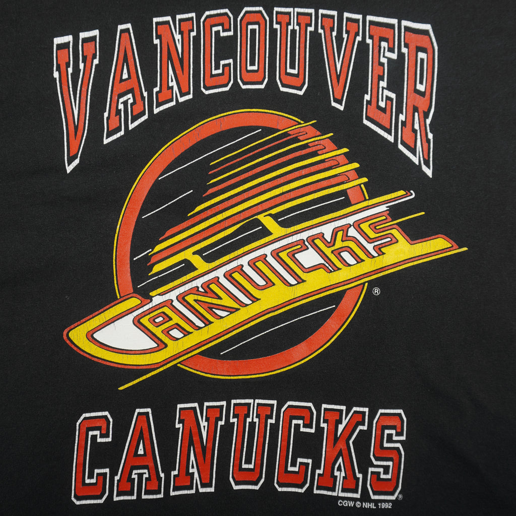 NHL (CGW) - Black Vancouver Canucks Spell-Out T-Shirt 1992 Medium Vintage Retro Hockey