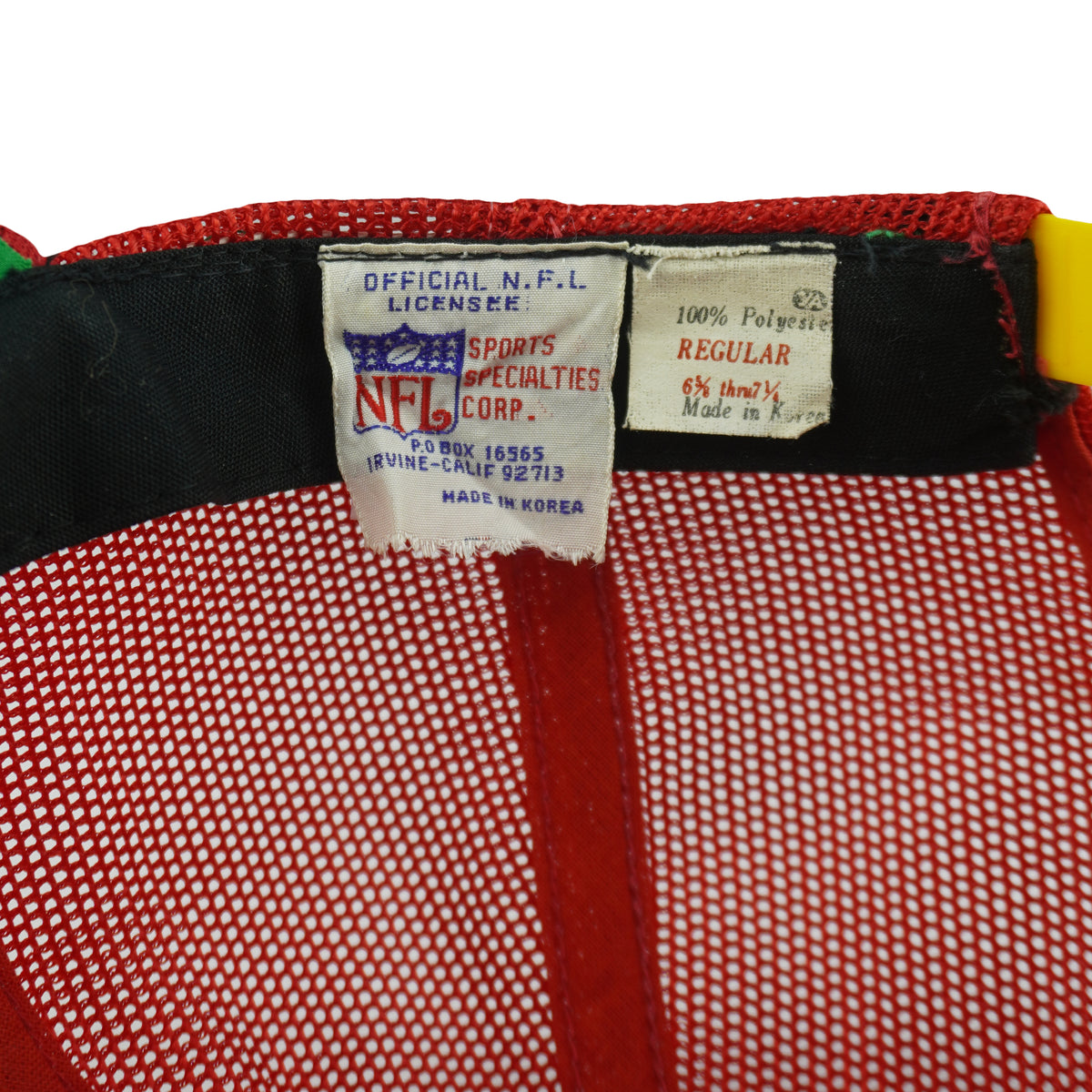 Sports Specialties maker and size-range labels inside the trucker hat