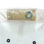 Twins Enterprise maker label inside the Titans hat
