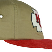 Small dark mark visible on the side of the khaki crown