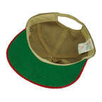 Interior sweatband and green underside of the red corduroy brim