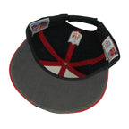 Interior red seam tape and gray underside of the hat brim
