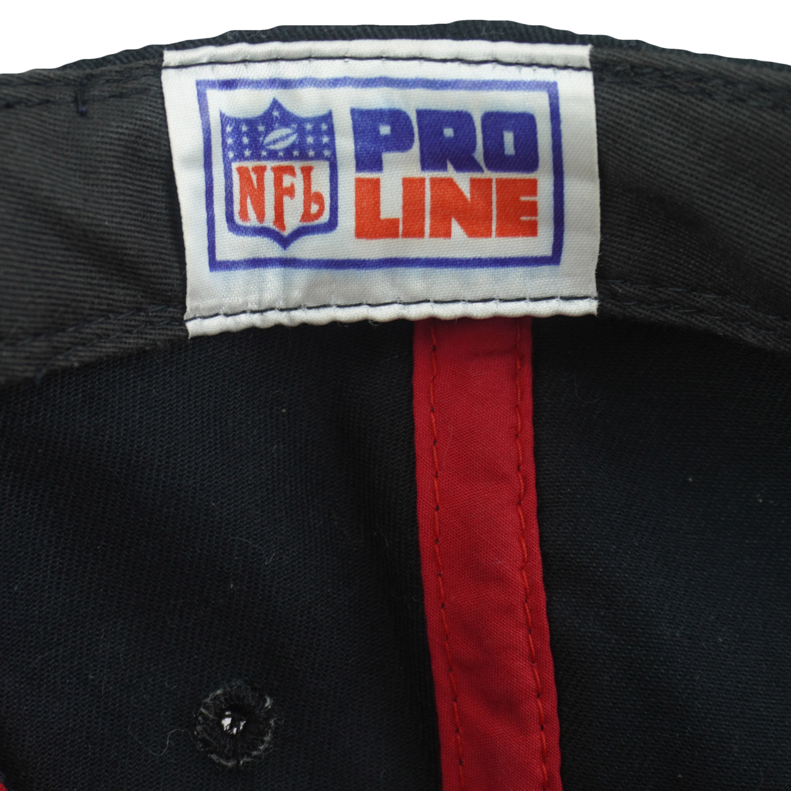 NFL Pro Line label sewn inside the black Buccaneers hat