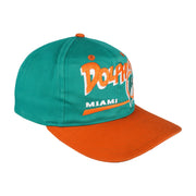 Angled view of the green crown and orange curved brim