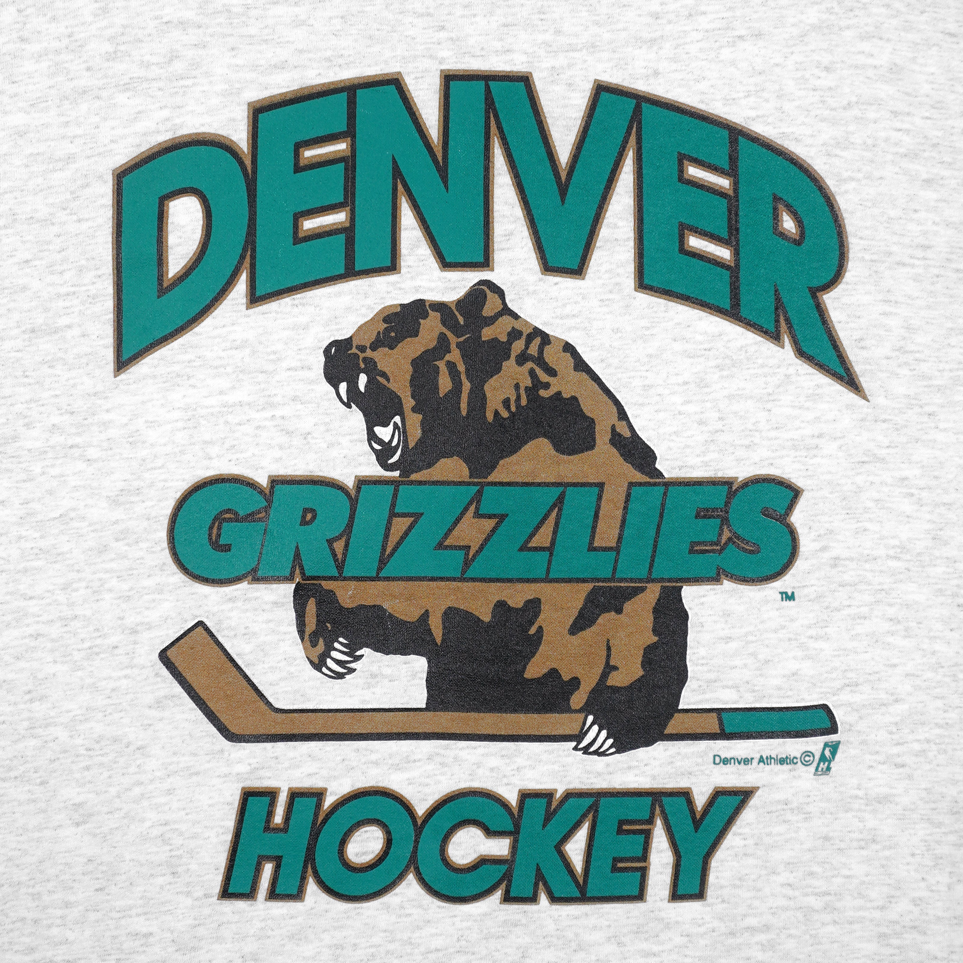 Vintage IHL (Soffe) - Denver Grizzlies Ice Hockey T-Shirt 1990s Large in gray and white