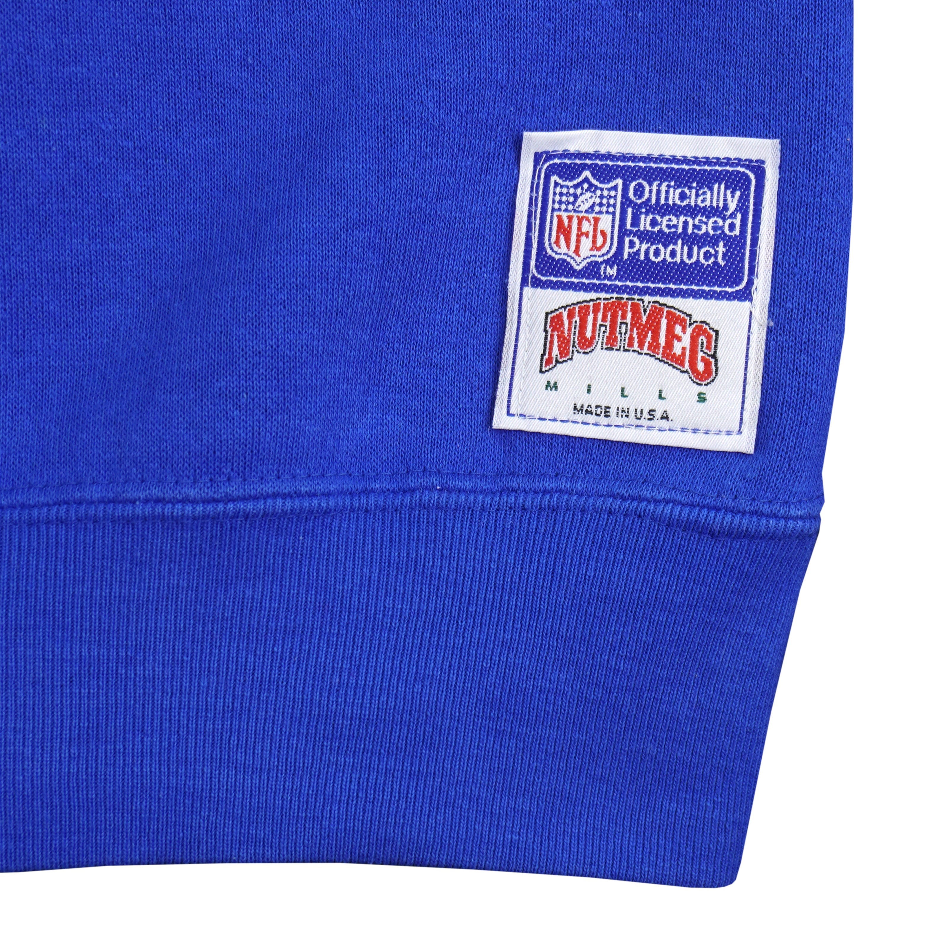 NFL licensed-product patch near the sweatshirt hem
