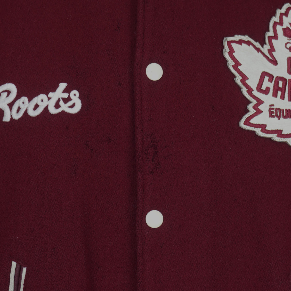 Burgundy and cream Roots Canada Team Canada Salt Lake 2002 varsity jacket