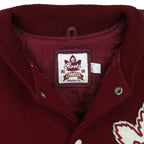 Burgundy and cream Roots Canada Team Canada Salt Lake 2002 varsity jacket