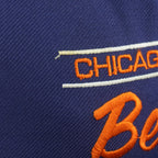 Small loose thread beside the front Bears embroidery