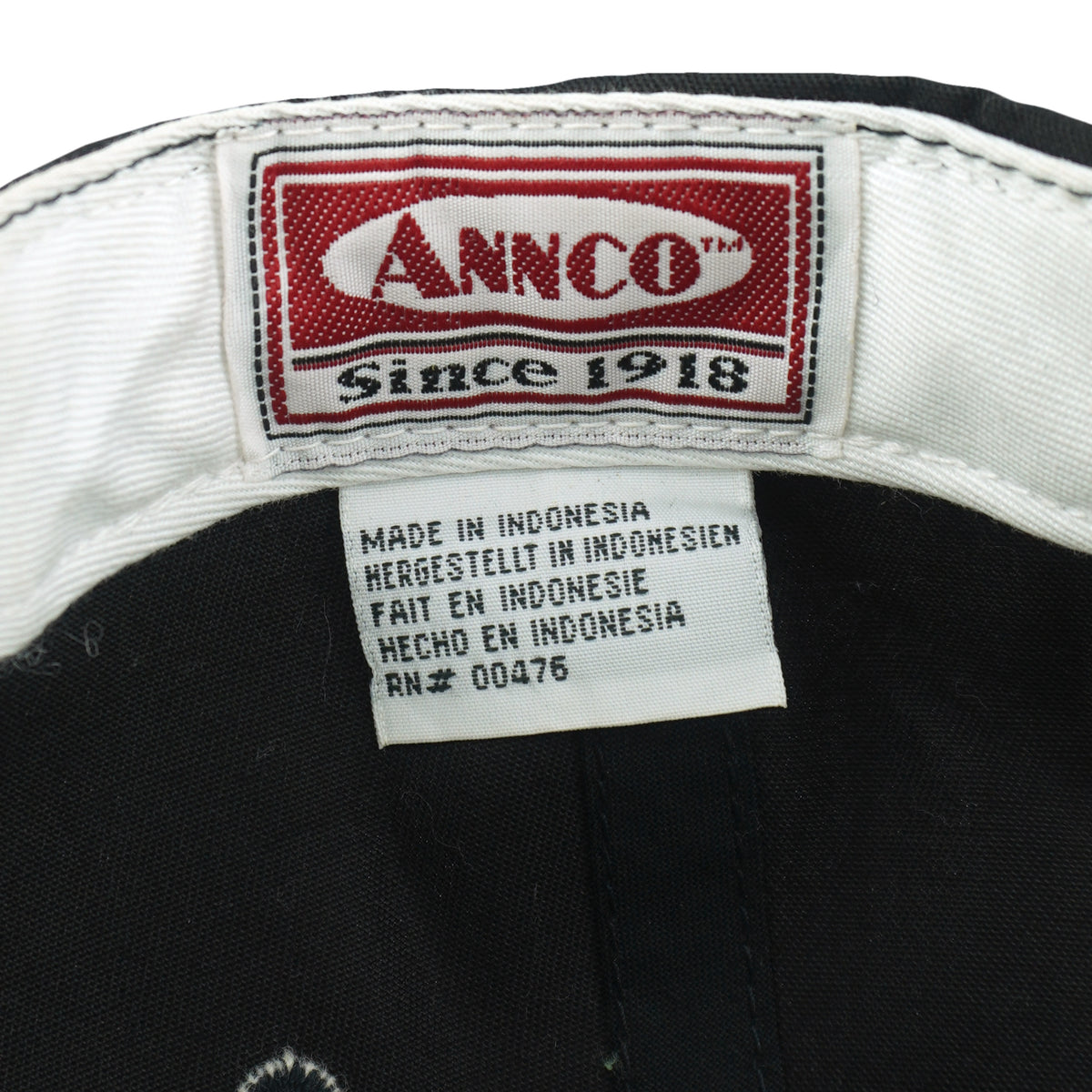 Annco maker and origin labels inside the black cap