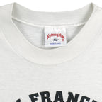 Nutmeg Mills X-Large label inside the white collar