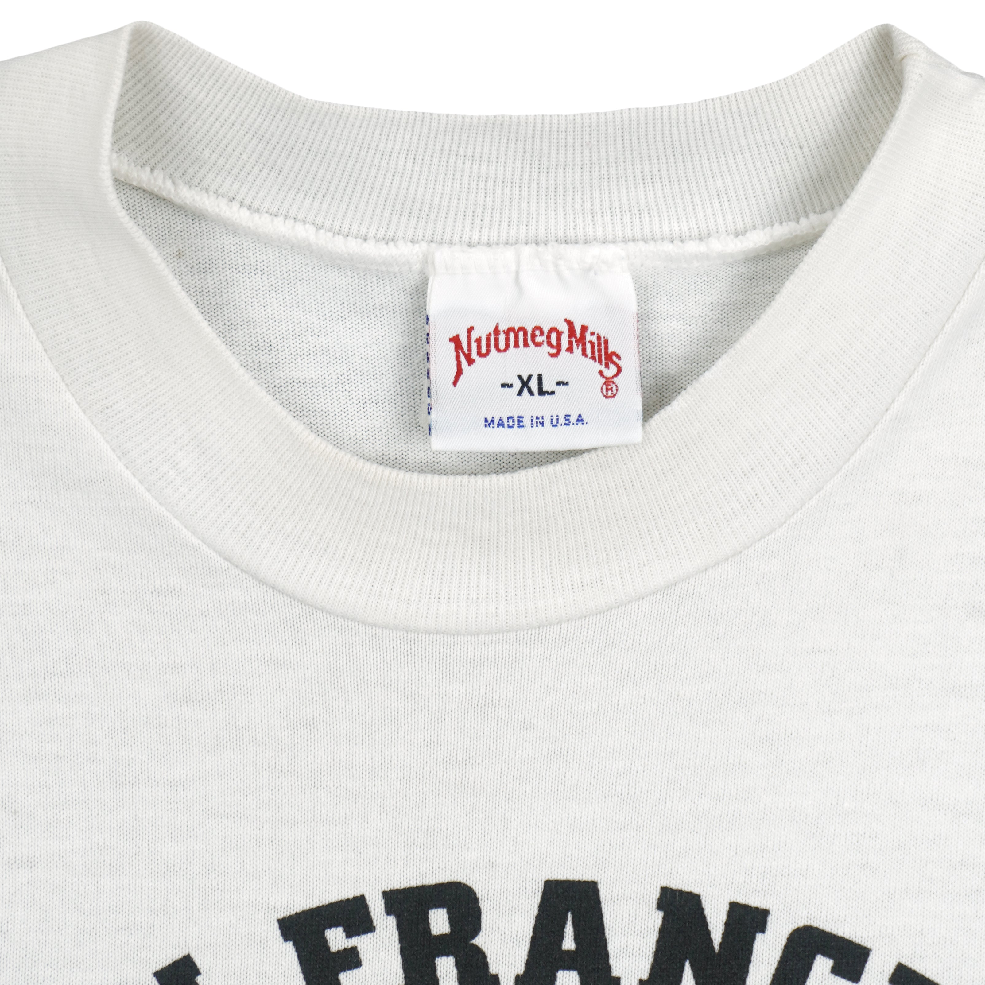 Nutmeg Mills X-Large label inside the white collar